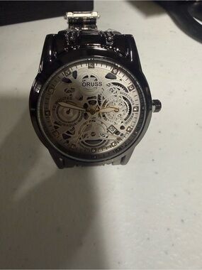 # 106 Oruss Men's Skeleton Dial Watch in Black and Silver